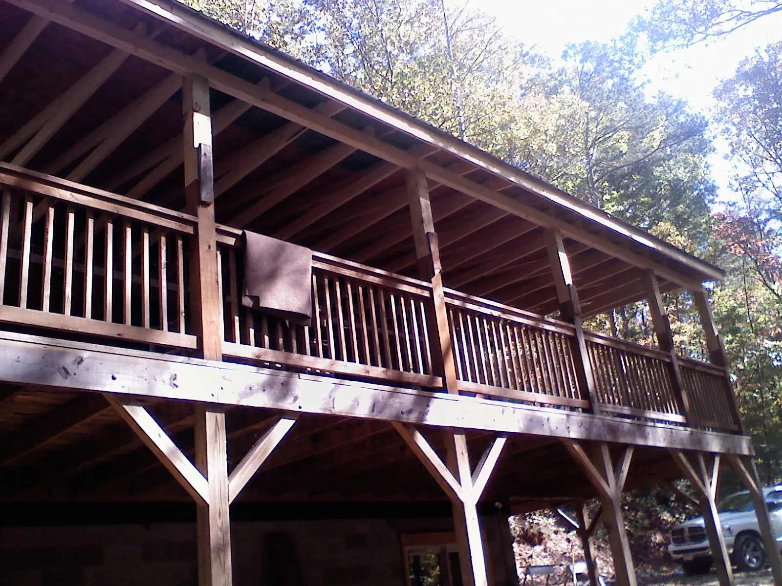 Timber framing under a new elevated porch and deck — Roof Leak Repair in New Brunswick by Roofing Brothers